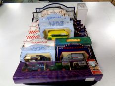 A tray containing assorted die cast vehicles to include Railway Express parcel vans, Hamley's,