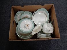 A box containing a Wedgwood Tiger Leaf dinner service