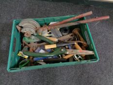 A plastic crate of a large quantity of hand and gardening tools,