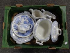 A box containing seven pieces of 19th century blue and white dinner ware