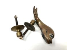 A bronze dolphin door knocker and striking plate.