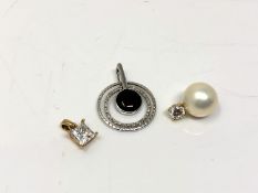 Three 14ct gold pendants. CONDITION REPORT: 5.