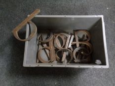 A box of a quantity of metal letters