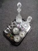 A tray containing two lead crystal decanters with stoppers together with assorted drinking glasses,