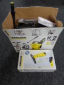 A Karcher K2 pressure washer with accessories together with a Karcher window vac