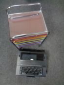 A Silver Reed EX 43N typewriter together with a six drawer under desk chest