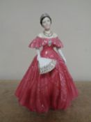 A Royal Worcester figure of Queen Elizabeth, The Queen Mother,