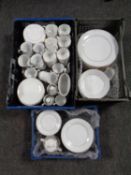 Three crates of assorted white dinner ware to include Thomas,