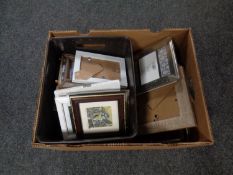 A box containing a quantity of new picture frames