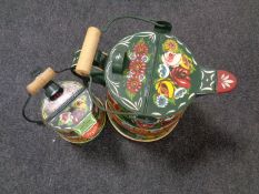 Two painted metal barge watering cans