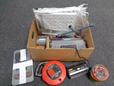 A box containing toolbox and tools, extension lead, folding step, torque wrench,