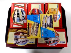 A tray containing seven Corgi die cast buses and trams (boxed)