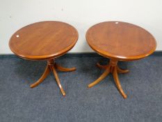 A pair of Bradley Furniture reproduction yew wood pedestal wine tables