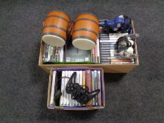 Two boxes containing X Box, Wii,