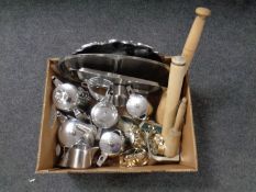 A box containing a quantity of stainless steel tea ware, napkin rings,