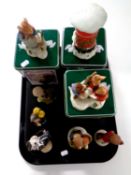 A tray containing three Villeroy and Boch fox wood tail ornaments in tins together with five