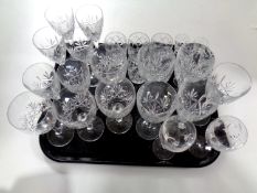 A tray containing assorted lead crystal drinking glasses to include Edinburgh Crystal