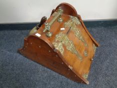 A 19th century mahogany coal receiver with brass mounts and shovel