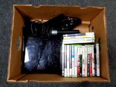 A box containing an X Box 360, leads,