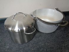 A stainless steel lidded pan together with an aluminium cast iron handled jam pan
