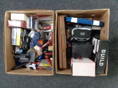 Two boxes containing paint brushes, cased socket sets, drill bits, sander, glue gun,