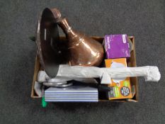 A box containing miscellany to include eastern copper urn, cast iron rabbit door stop,