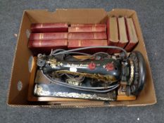 Ten music story volumes together with a vintage Singer electric sewing machine