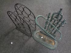 A cast iron Victorian style stick stand together with a metal wine rack