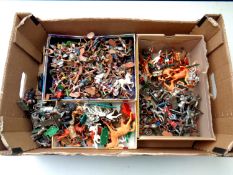 A box of a large quantity of mid 20th century plastic soldiers to include Britains,
