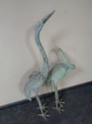 Two cast metal garden figures,