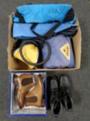 A box of sleeping bag, mats, folding tripod seat, cool bag,