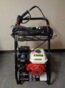 A Swiss Kraft 2500 PSI petrol washer on trolley