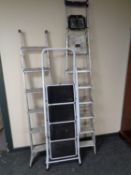 Two sets of folding aluminium steps together wit a further set of Cooper's four tread step ladders
