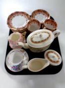 A tray containing part Victorian tea service,