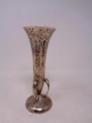 An Art Nouveau loaded silver vase, Walker & Hall, Sheffield 1909, height 16.