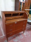 A mid 20th century Danish teak cylinder bureau