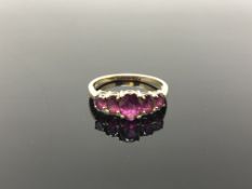 A 9ct gold five stone dress ring