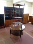 An early 20th century circular mahogany two tier occasional table together with a 19th century four