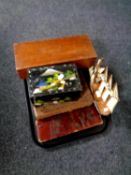A tray of assorted trinket boxes together with a wooden model of a ship