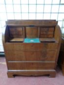A 19th century continental mahogany barrel fronted bureau fitted three drawers