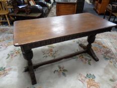 An oak refectory dining table on bulbous legs