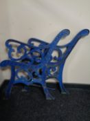 A pair of cast iron bench ends