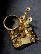 A tray of antique and later brass ware to include candlesticks, Chinese basket,