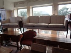 A 20th century wood framed continental three seater settee and two seater settee upholstered in a