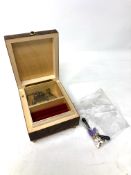 A 9ct gold pendant, 4 grams, together with two 9ct gold crucifix pendants, 2.