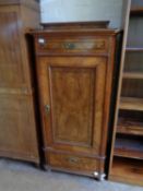 A 19th century mahogany and walnut cabinet fitted two drawers