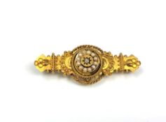 A 15ct gold pearl and diamond brooch CONDITION REPORT: 5.