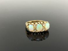 An gold opal and diamond ring, size P CONDITION REPORT: Apparently unmarked. 4.8g.