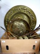 A box of a quantity of antique and later brass companion pieces, pair of brass fire dogs,