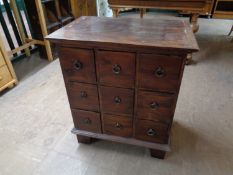 An eastern hardwood eight drawer chest